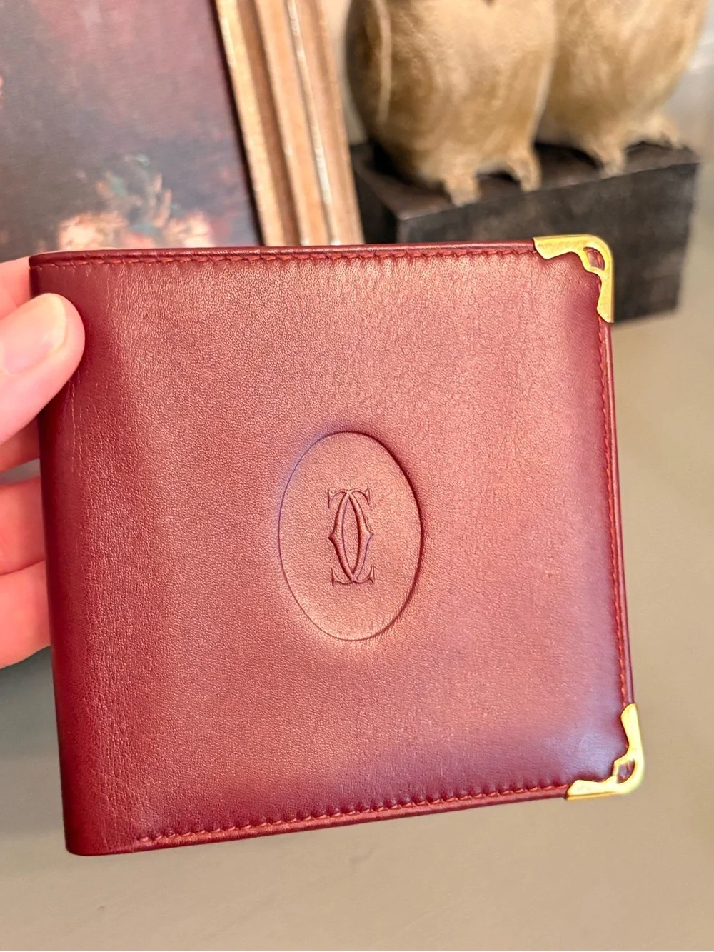 Cartier Burgundy Leather Men's Wallet with Gold Corner Accents